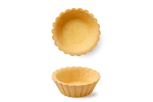 Empty tartlet and top view on white, a Food & Drink Photo by innakreativ