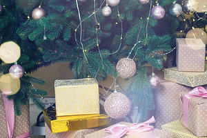 Beautiful holdiay decorated room containing christmas, tree, and decor