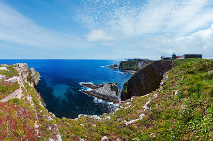 Summer blossoming Cape Vidio coastline landscape with lighthouse, a Nature Photo by YuriyB