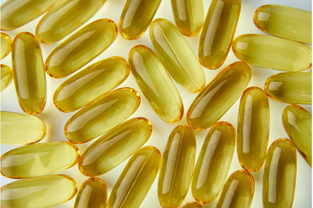 Flat lay fish oil capsules Omega 3, a Health & Medical Photo by IlliaBondarPhotography