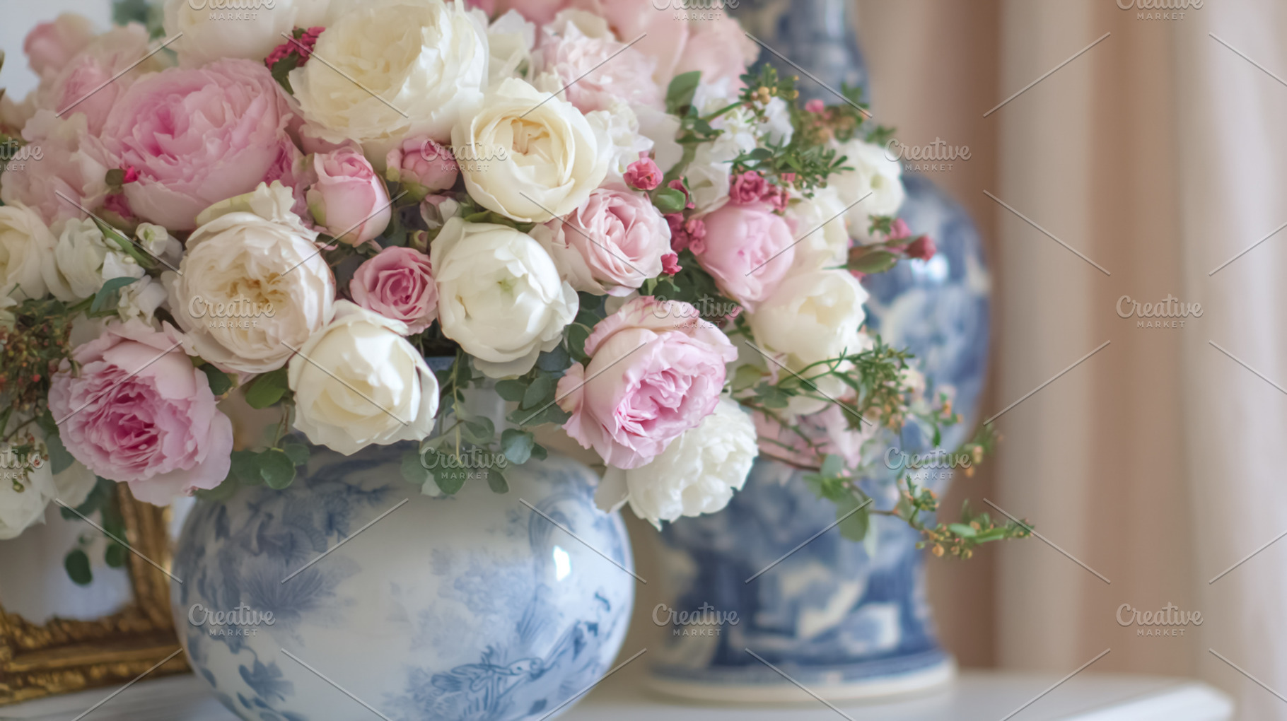 Pink and white roses bouquet arranged in blue and white decorati, a Photo by Studio ANNA
