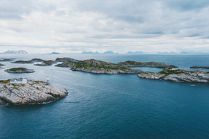 Lighthouse and island ocean aerial v