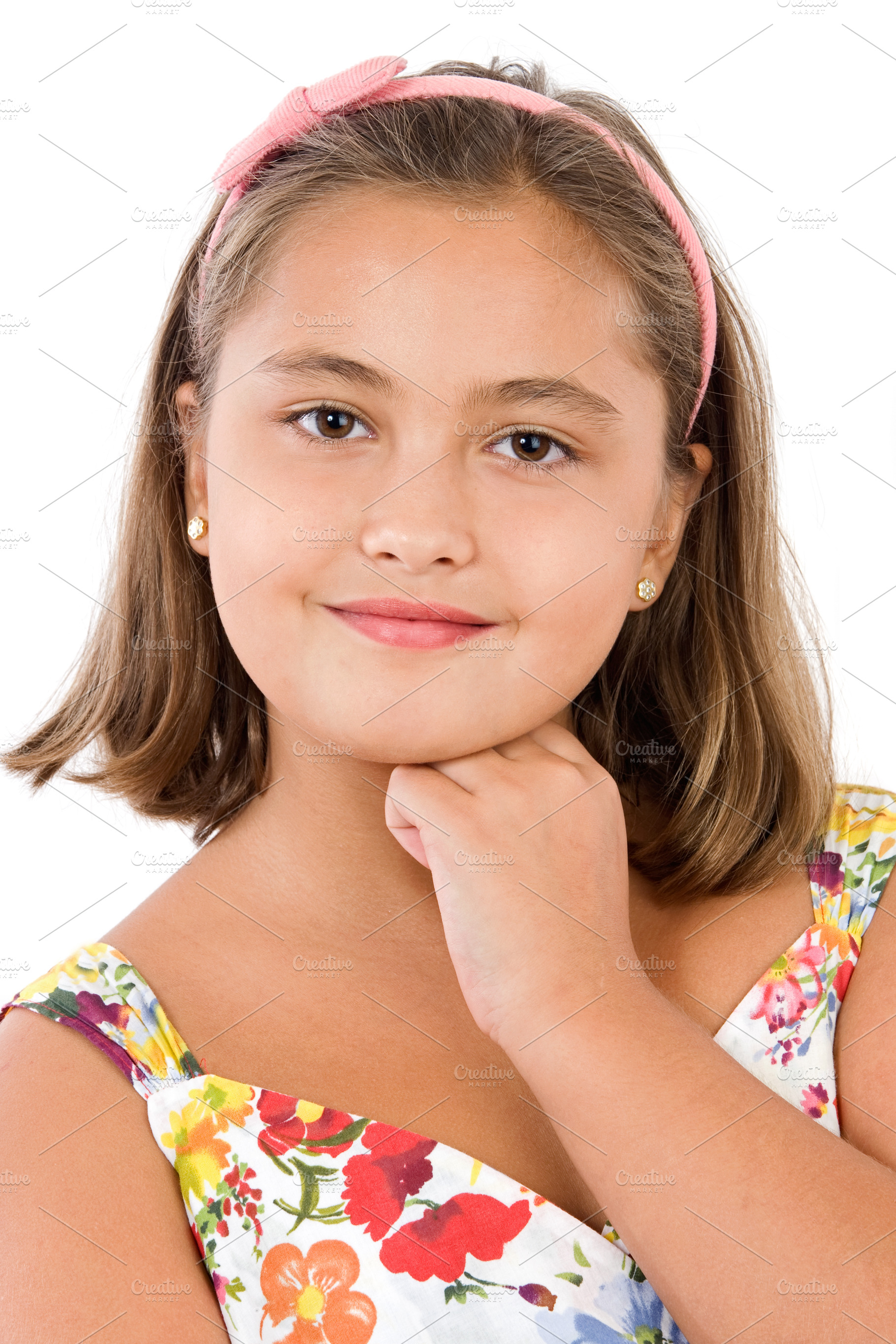 Adorable girl with flowered dress thinking, a Person Photo by José Manuel Gelpi