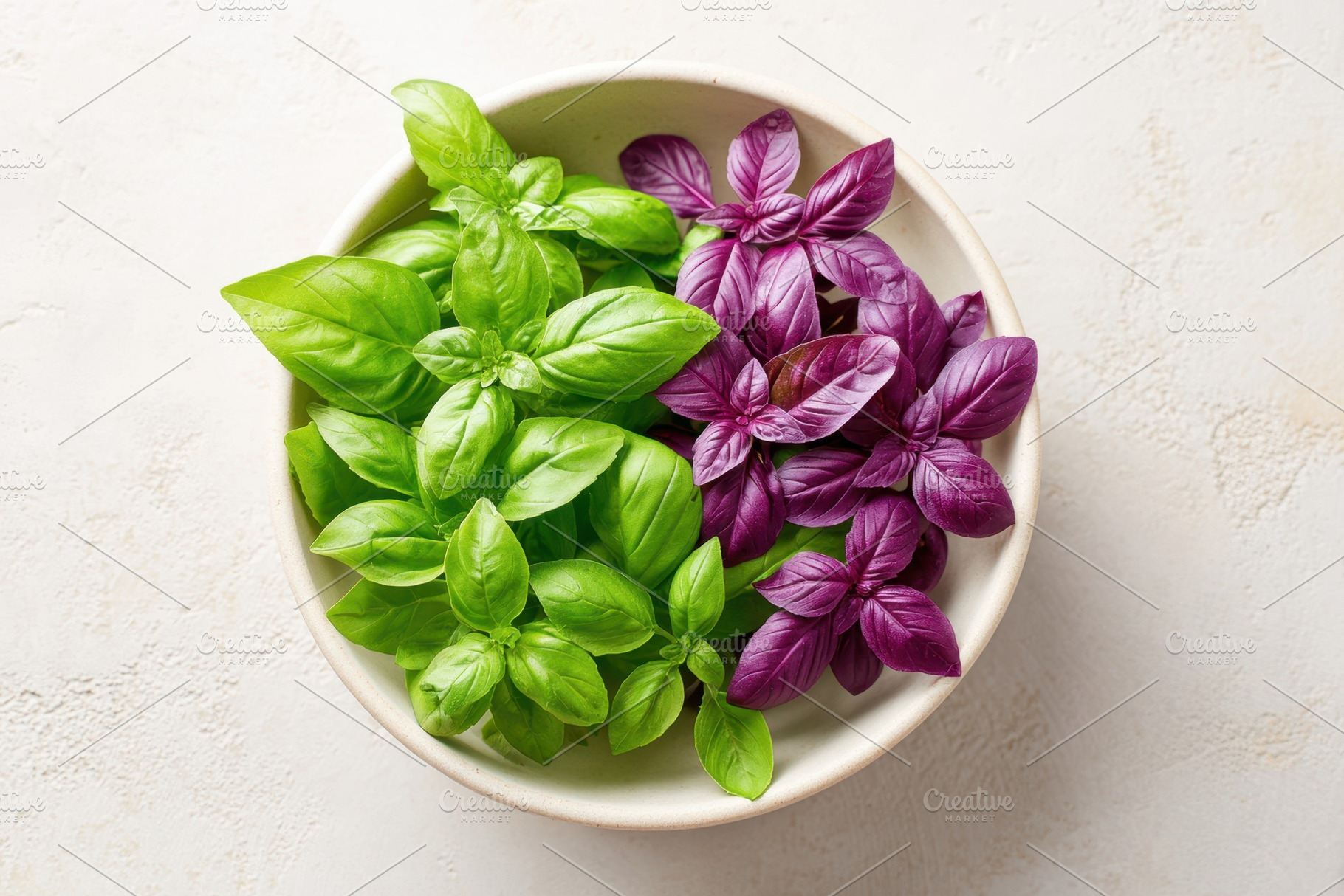 Fresh green and purple basil in a bowl, a Food & Drink Photo by AlyaAnd