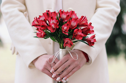 Wedding bouquet in bride's hands featuring bouquet, rustic, and bride