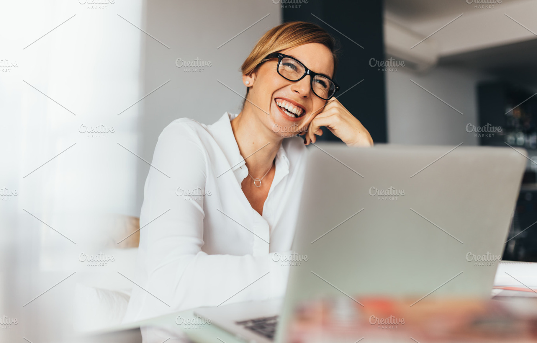 Business woman at her desk stock photo containing business and business woman, a Business Photo by Jacob Lund