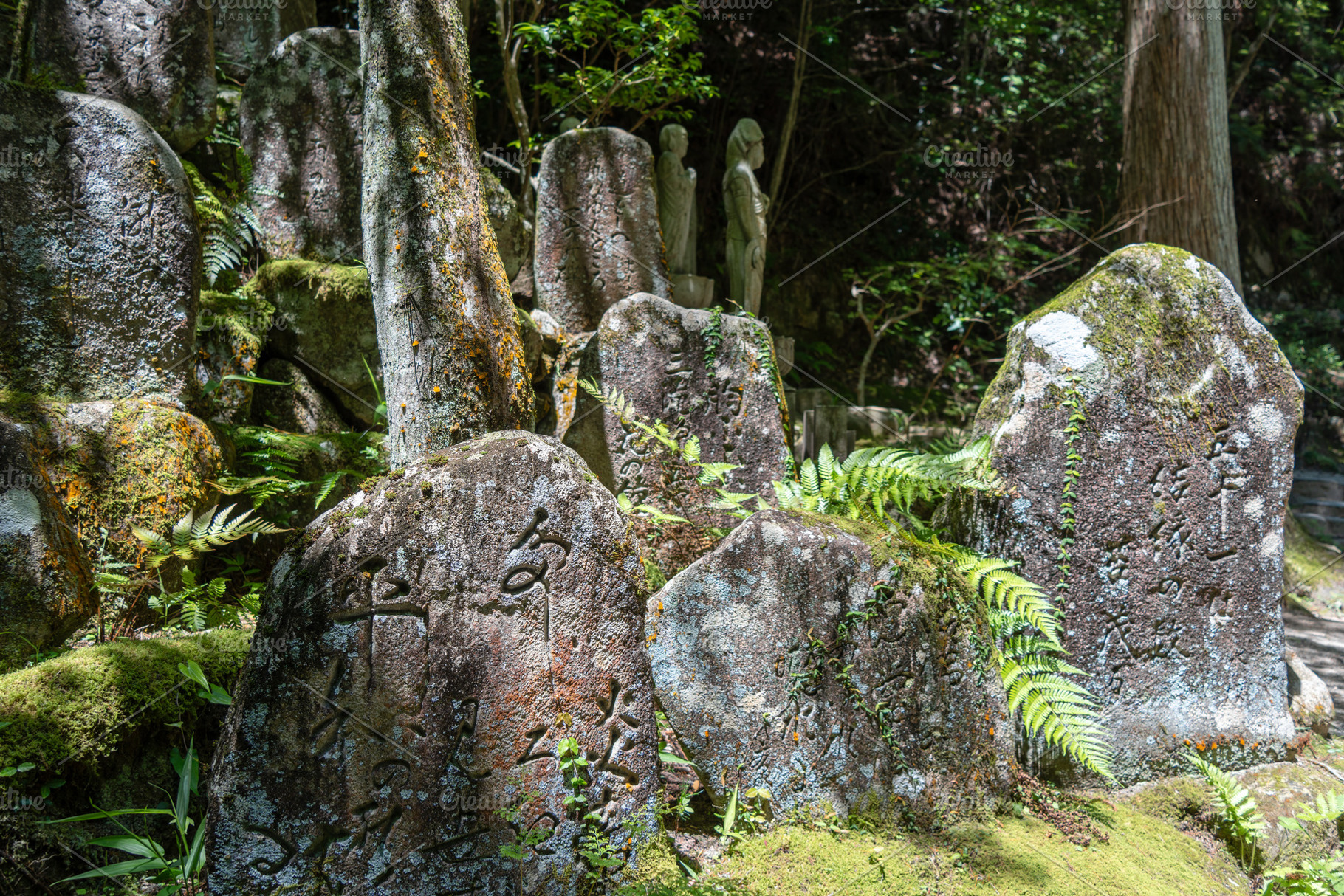 Engraved stones and statues at Mitaki-Dera temple in Hiroshima,, an Arts & Entertainment Photo by GoodGoods