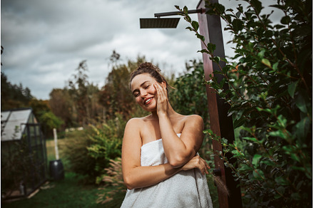Beautiful woman resting in garden, a Beauty & Fashion Photo by HalfPoint