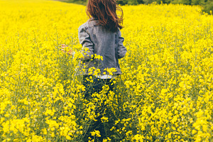 Girl running in a yellow field containing girl, run, and running