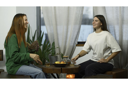 Young women drink tea and have fun, a Person Photo by Media Whale Stock
