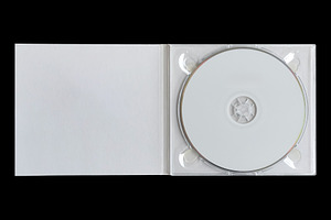 cd in white cardboard sleeve, a Background Photo by sirylok