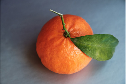 Ripe tangerine with leaves isolated, a Food & Drink Photo by Rohan Photography