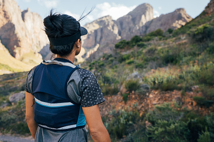 Back view of woman in hiking attire, a Sports & Recreation Photo by Artem Varnitsin