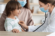 Medicine and kids healthcare concept. Professional pediatrician examining littl, a Photo by Prostock-Studio (Thumbnail 1 of 2)