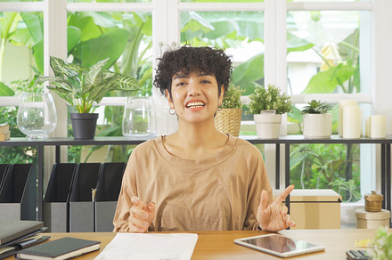 Business Asian american woman, person working from home, talking, a Photo by Tampatra