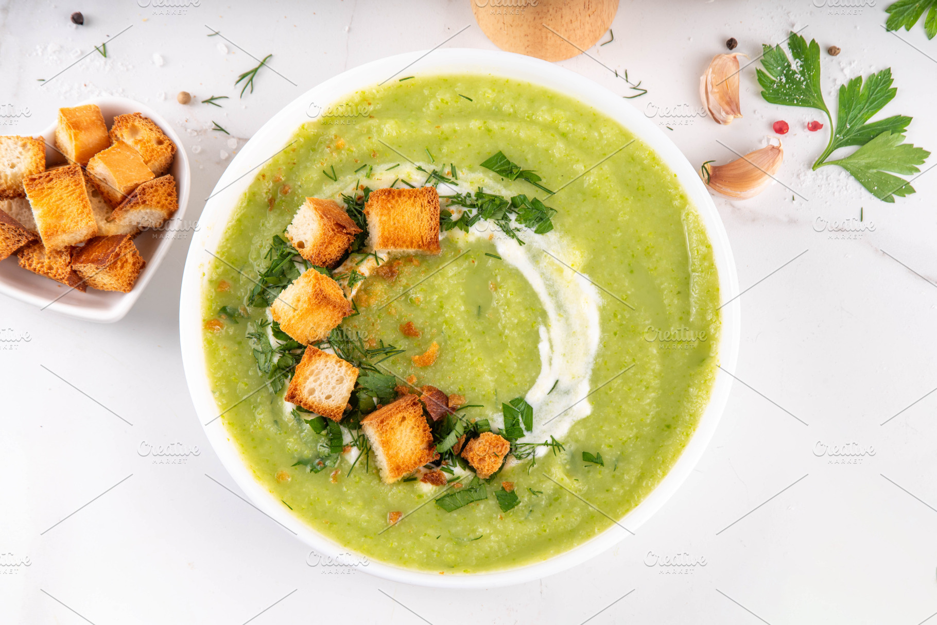 Tasty vegan zucchini cream soup with hard cream and croutons, a Food & Drink Photo by Rimma
