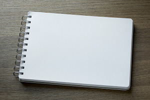 Blank spiral notebook stock photo containing notebook and paper