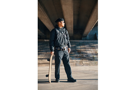 Skater male with skateboard on, a Person Photo by Gladkov photography