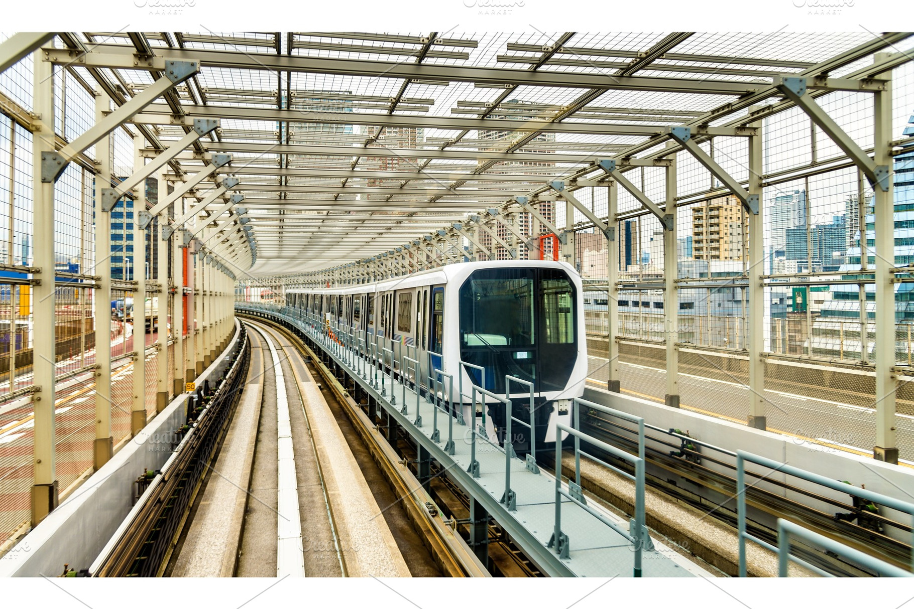 Train at Yurikamome line on the Rainbow bridge in Tokyo, a Transportation Photo by Leonid Andronov