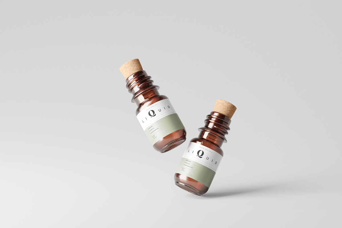 Amber Glass Bottle With Cork Mockup, a Cups & Container Mockup by pmvch (Photo 2 of 10)