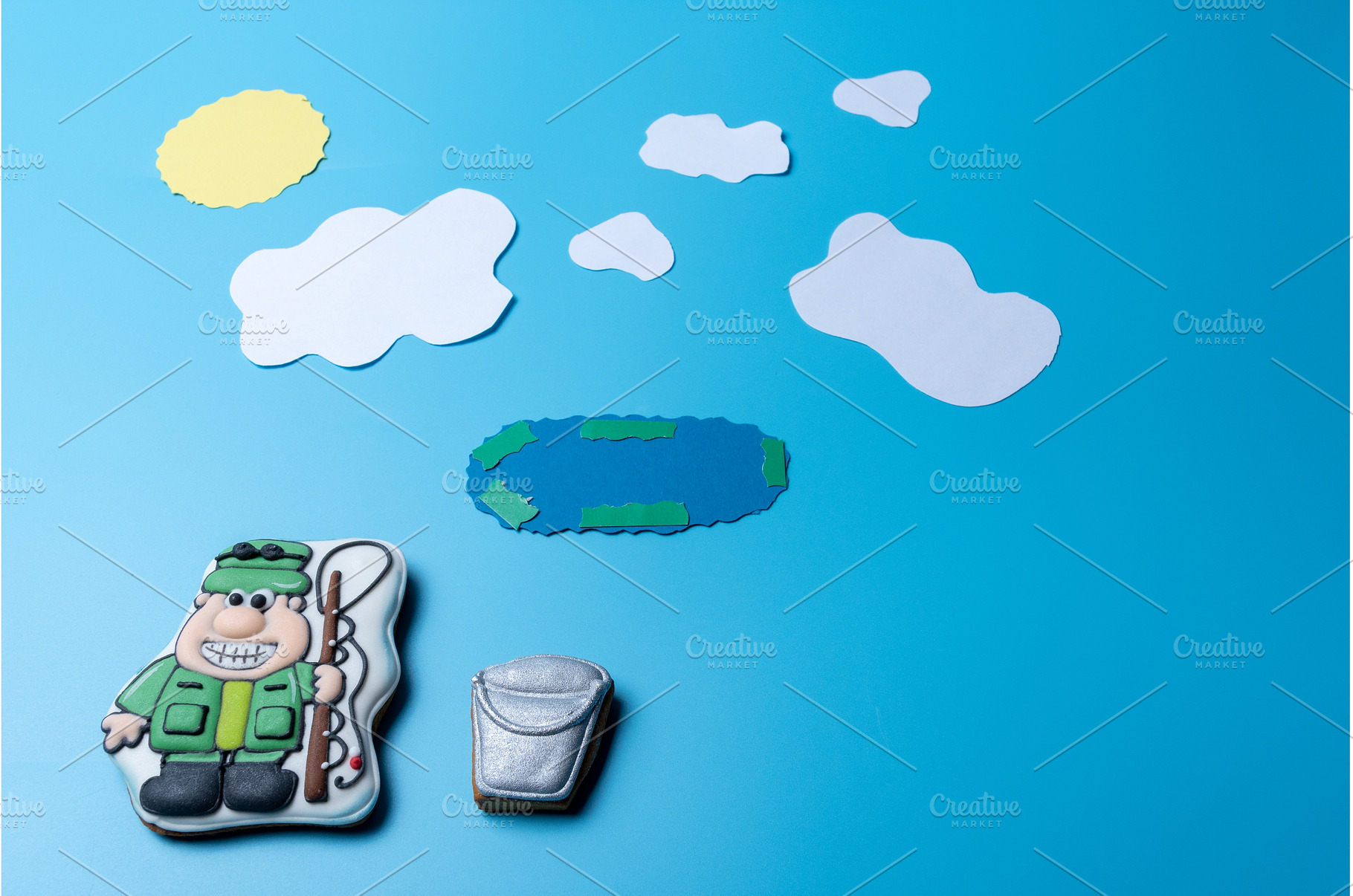 Fisherman with a Bucket and Fishing, a Background Photo by Stockphoto by vzwer