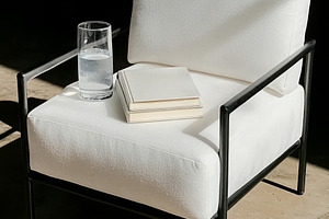 Empty chair with books and glass, a Photo by Dvoevnore photos