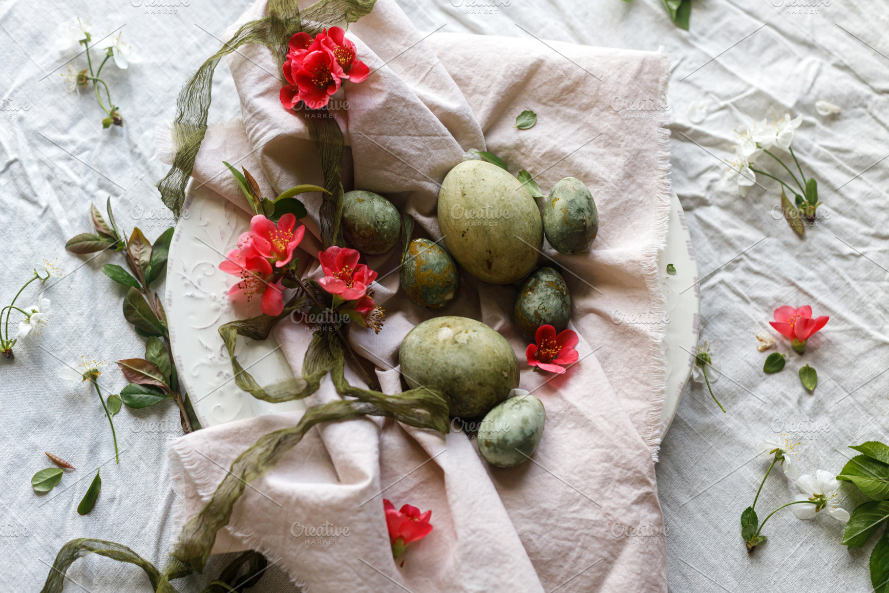 Easter celebration. Stylish green easter eggs, flowers, cherry b, a Holiday Photo by Sonjachni