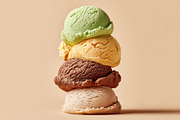 Stacked ice cream scoops on beige background, a Food & Drink Photo by AlyaAnd (Thumbnail 1 of 2)