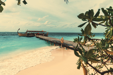 A wooden vessel on a Maldives resort, a Holiday Photo by SkyNext