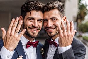 Happy Grooms Showing Wedding Rings Together, a Person Photo by Davizro's Market