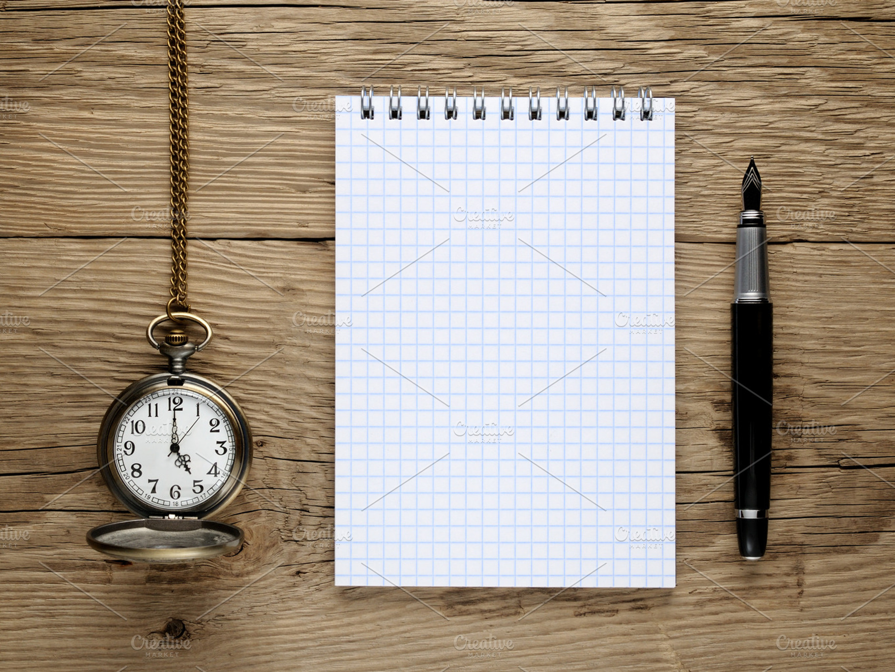 Watch fountain pen and note book containing fountain, pen, and writing