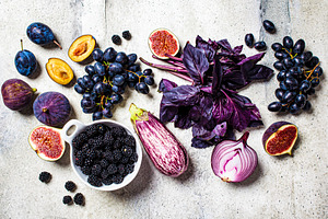 Raw purple vegetables and fruits featuring assortment, background, and banner