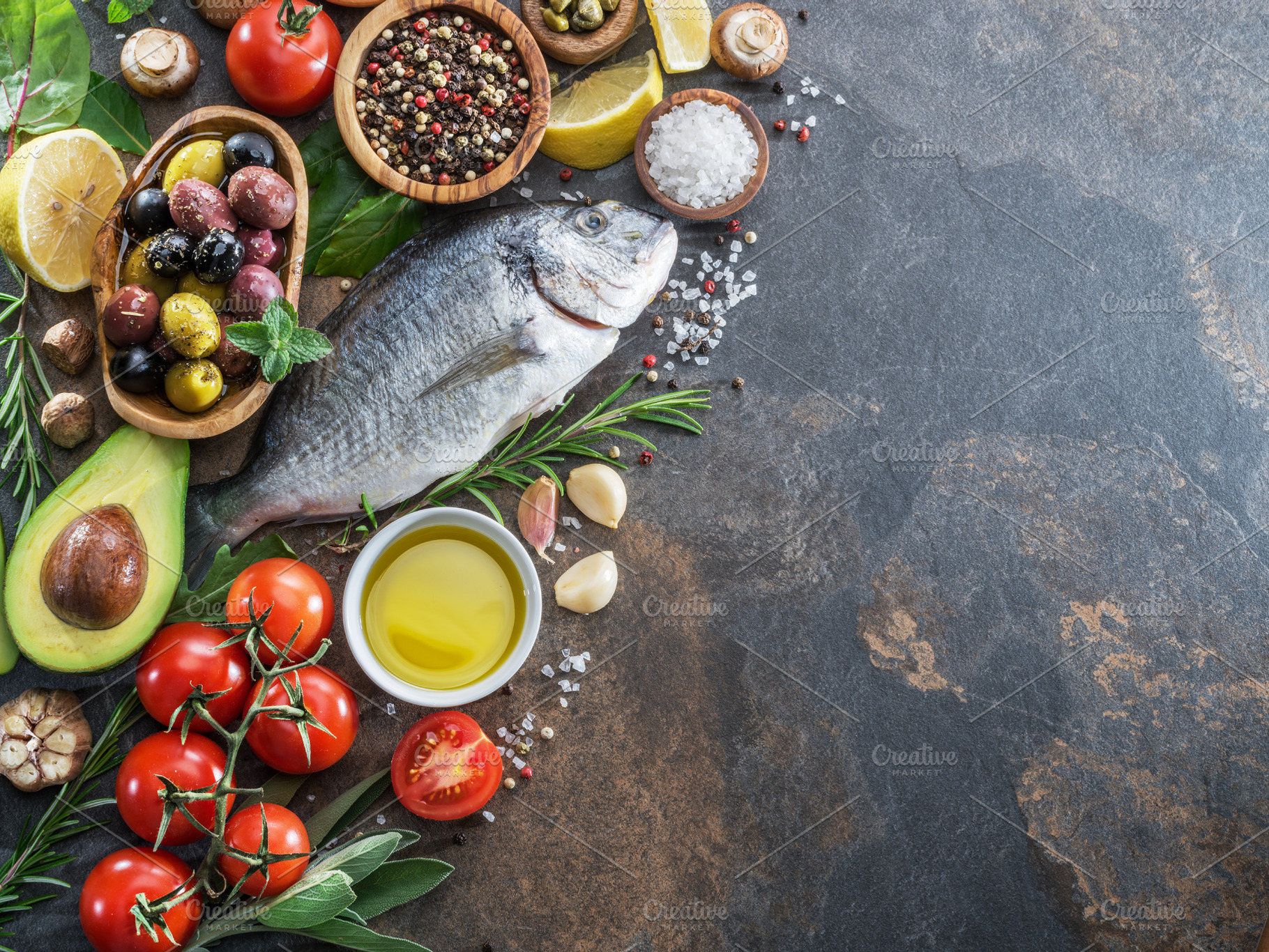 Raw dorado fish with spices and vege, a Photo by Volff
