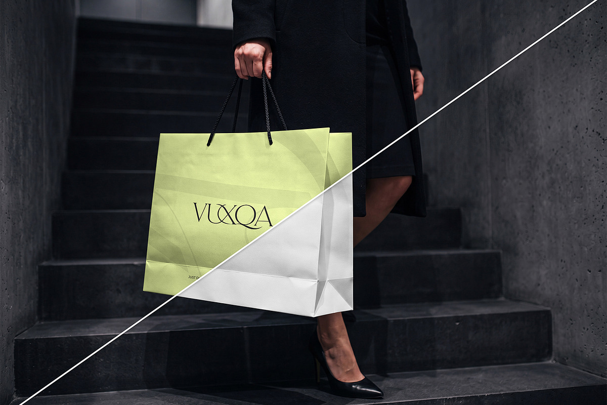 Paper Shopping Bag Mockup with Model, a Packaging Mockup by graphypix (Photo 3 of 4)