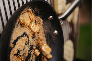 Melting brown sugar and butter in, a Food & Drink Photo by HalfPoint