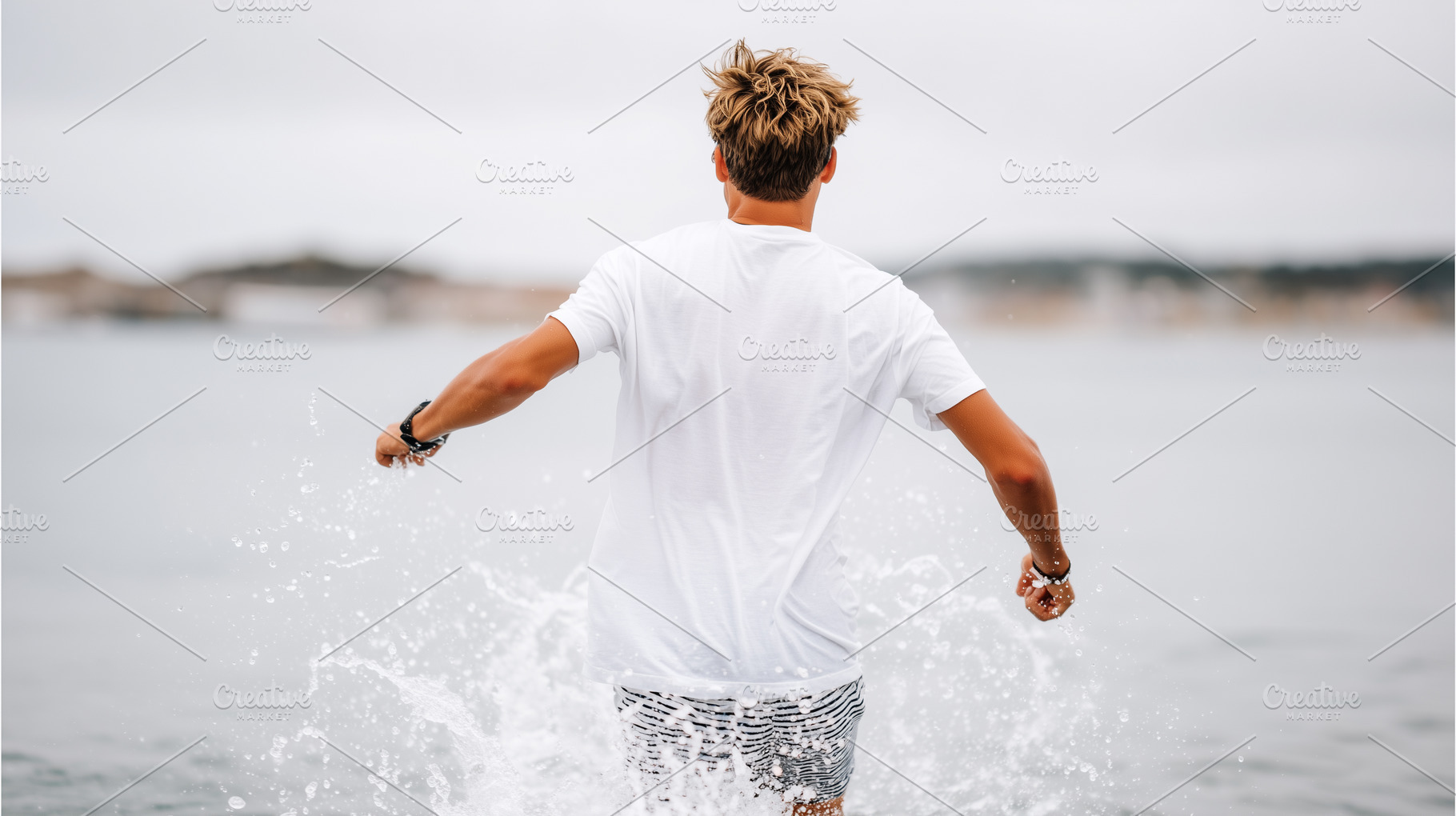 Young man running into the sea with, a Sports & Recreation Photo by MistyDay