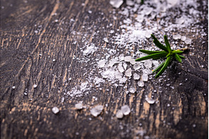 Natural sea salt crystals on dark, a Food & Drink Photo by Yulia Furman