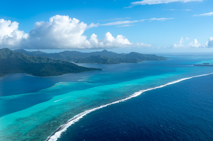 Aerial view of Tahaa island, French Polynesia, with turquoise la, a Nature Photo by GoodGoods