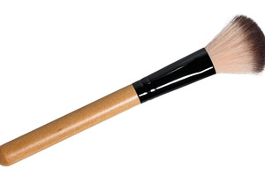 Professional makeup brush with brown bristles on isolated backgr, a Beauty & Fashion Photo by ndanko