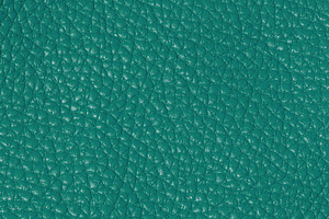 A detailed macro shot of genuine, high-quality leather in a rich, a Background Photo by ndanko
