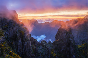 Mountains on sunset covered in fog, a Nature Photo by f9photos