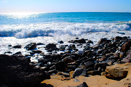 Ocean blue featuring ocean, blue, and rocks