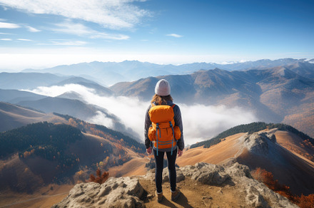 Woman with backpack standing on the, a Photo by Iftikhar Alam
