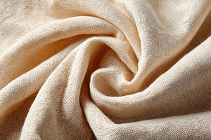 Close-up of textured beige fabric, a Background Photo by AlyaAnd