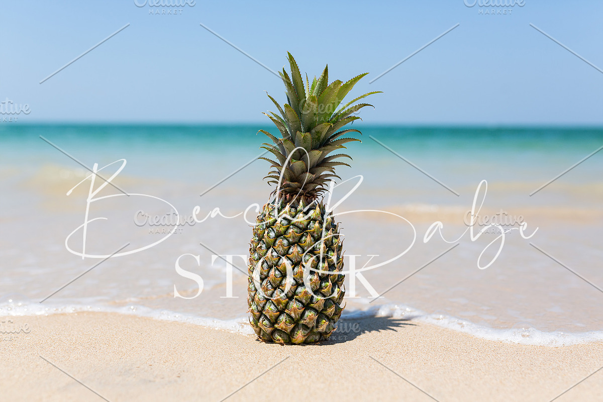 A pineapple on the beach, a Food & Drink Photo by Beach Babe Stock (Photo 2 of 2)
