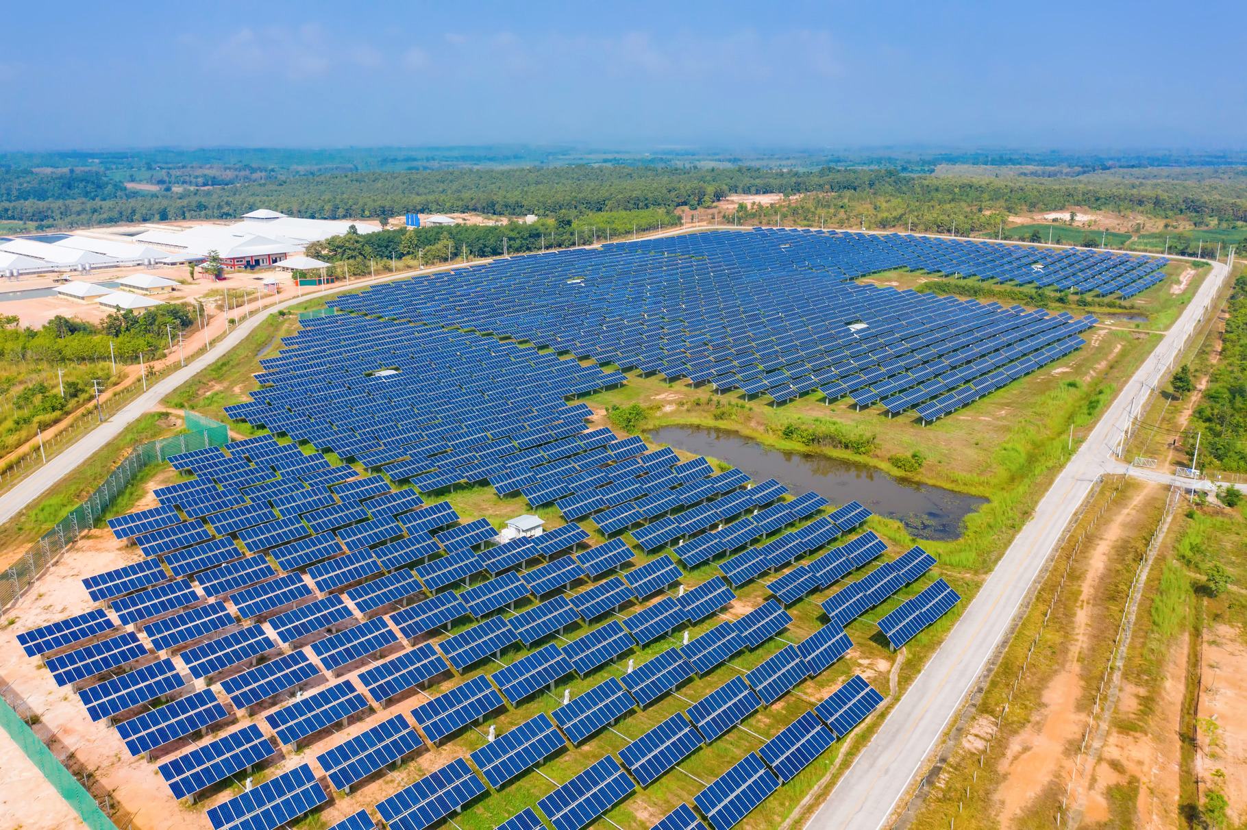 Aerial view of solar panels or solar, a Background Photo by Tampatra