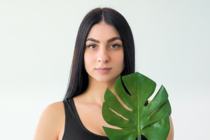 Tropical treatment eco cosmetic woman green leaf, a Person Photo by Photo Drive Studio