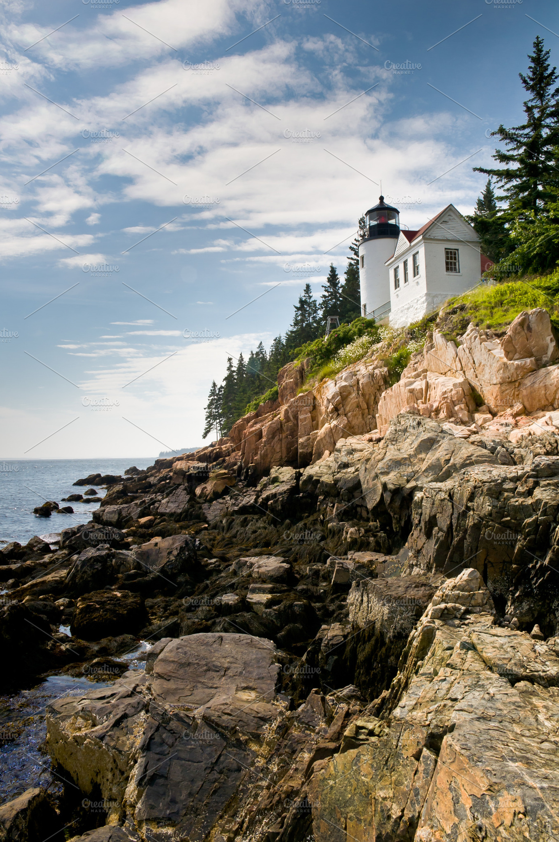 Bass harbor head lighthouse featuring light house, cliff, and sky, a Nature Photo by jeffportaro