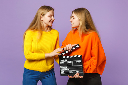 Two smiling young blonde twins siste stock photo containing alike and