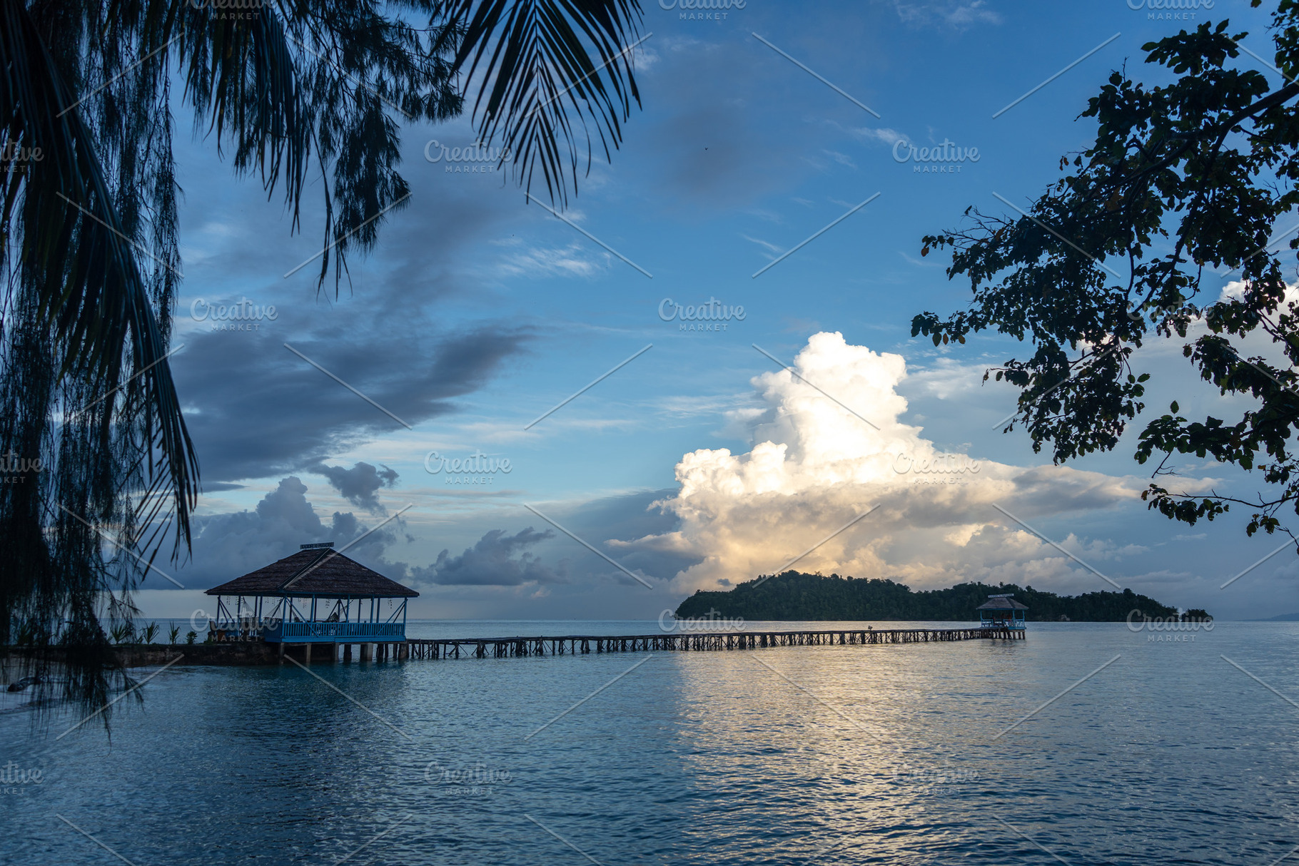 Sunset view of pier on Kadidiri Island, Togian archipelago, Sula, a Nature Photo by GoodGoods